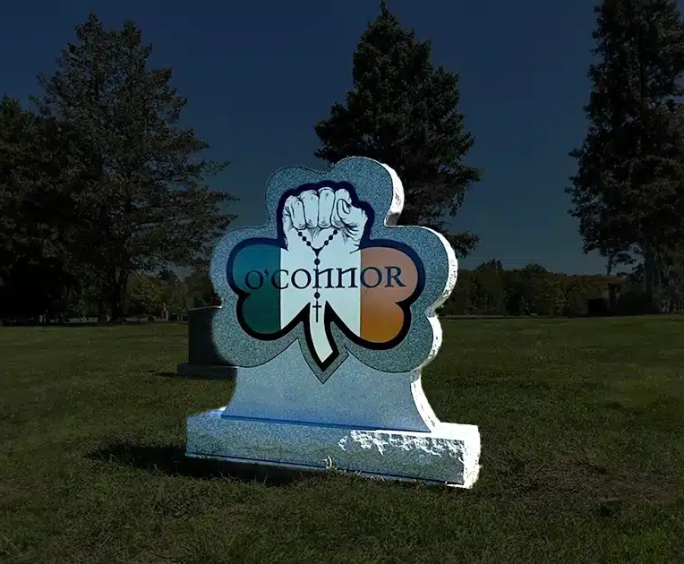 Shamrock-shaped granite monument with a custom porcelain O'Connor memorial portrait