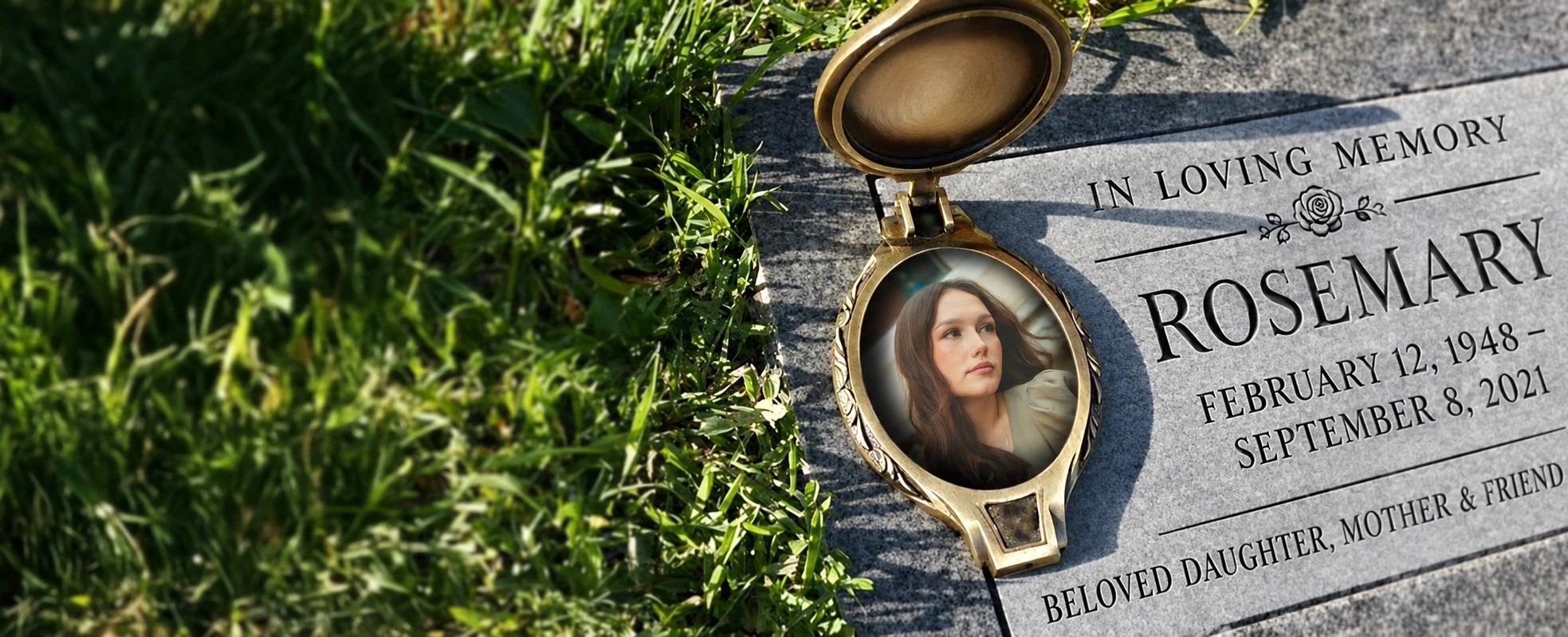 Bronze memorial marker with an oval porcelain cameo portrait set in granite